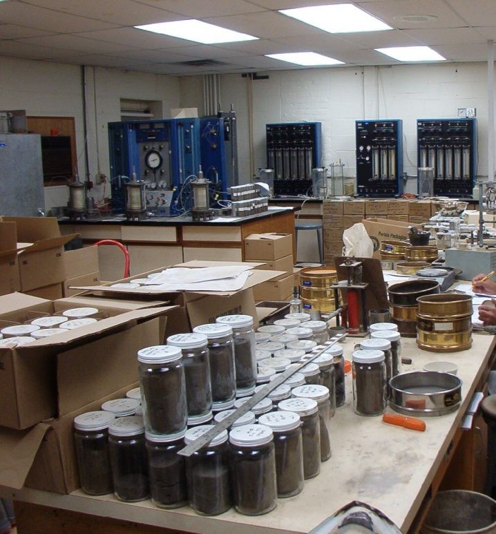 Geotechnical engineers conducting soil testing